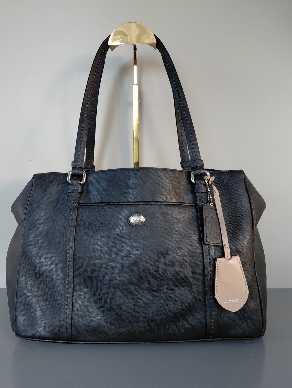 Classic Black Leather Tote Bag with Beige Tag